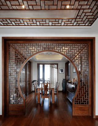 中式圆景框式隔断屏风餐厅实景